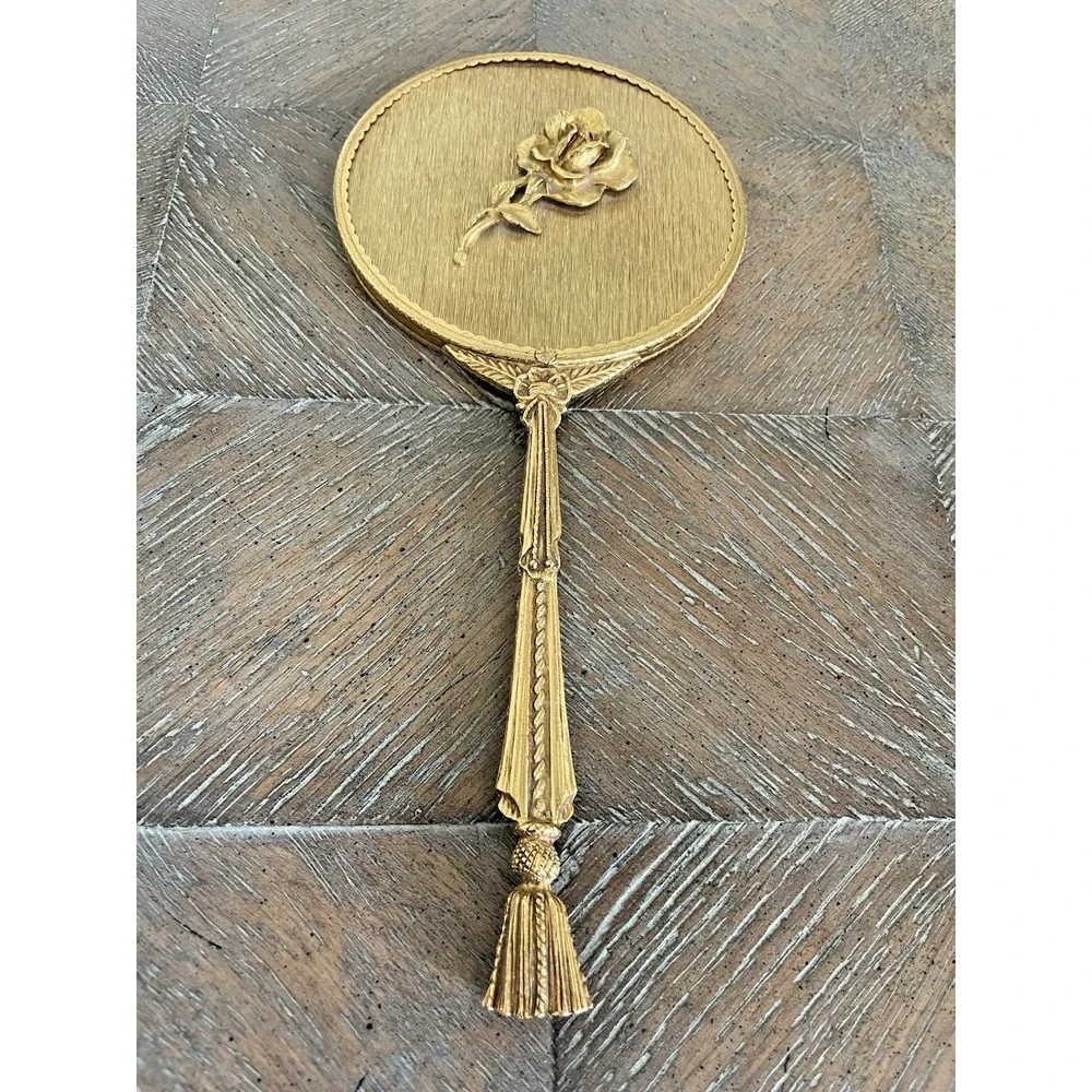 Vtg Matson Stylebuilt Hand Held Mirror Gold Tone Rose and Rope Tassel Design
